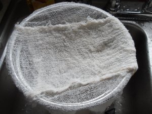 a stable surface to drain the curd into